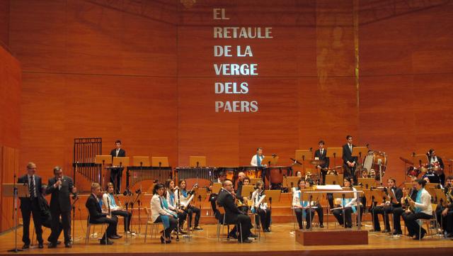 La Banda Municipal i Veus.kat han ofert el concert El Retaule de la Verge dels Paers, a l'Auditori, amb motiu Sta. Cecília, de la patrona de la música
